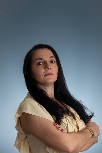 istock Young beautiful woman with arms crossed, confident. 1454045928