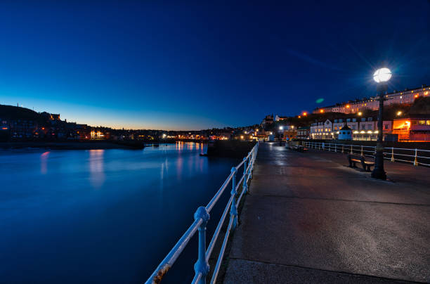 istock Whitby town architecture at twilight, Whitby, North Yorkshire, England, Britain 1454046905