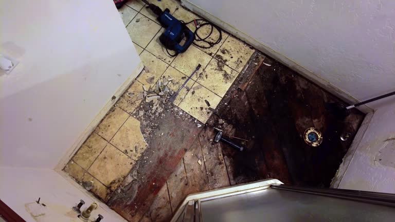 4K Timelapse Video of a bathroom tile tearout down to the subfloor