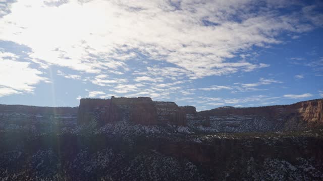 4K Drone Video of Colorado Monument Hyperlapse with blue sky and clouds aerial view