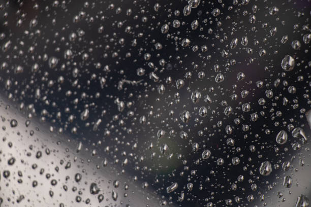 istock drops of water on a glass window after rain as a background 1454049049