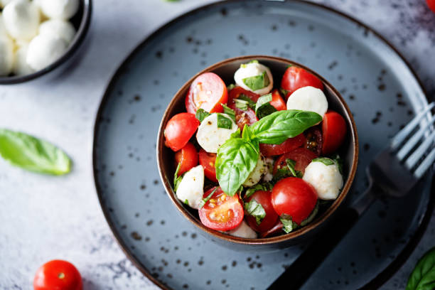 istock Tomato Basil mozzarella salad in a bowl 1454049784
