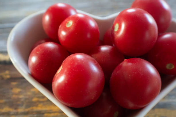 istock Cherry tomatoes in a heart bowl 1454050663