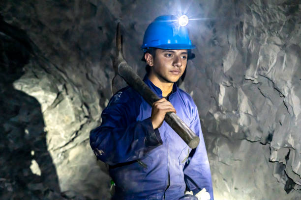 istock Portrait of a miner working in a subway coal mine. 1454051001
