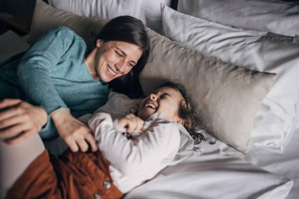 istock Mom and daughter in hotel suite 1454051983