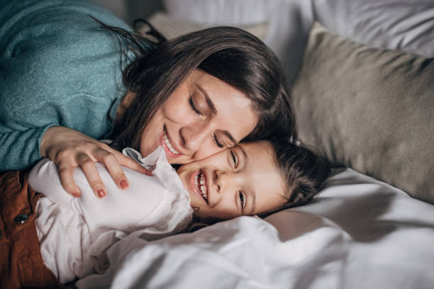 istock Mom and daughter in hotel suite 1454052136