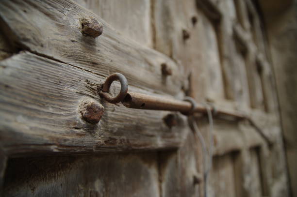 old lock on old wooden door