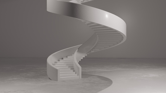 White spiral stairs rise from a white room