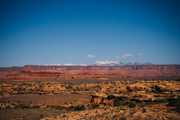 istock View across canyon to snowcapped mountains 1454057897