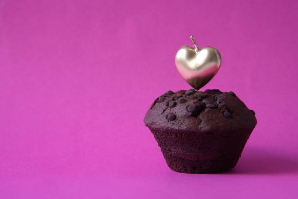 Valentine or thank you card with heart candles and muffin with copy space