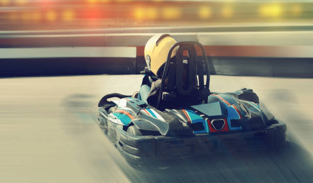 istock Female driving car for karting 1454060969