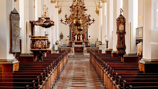 Saint Urban's Abbey is a former Cistercian monastery in the municipality of Pfaffnau in the canton of Lucerne in Switzerland. It is a Swiss heritage site of national significance. The monastery was founded in 1194 - the  new baroque chapel was realized in 1711.  The image shows the interior of the chapel with the beautiful altar.