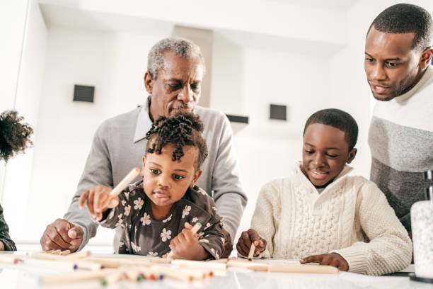 istock Grandad and grandkids at home 1454068075
