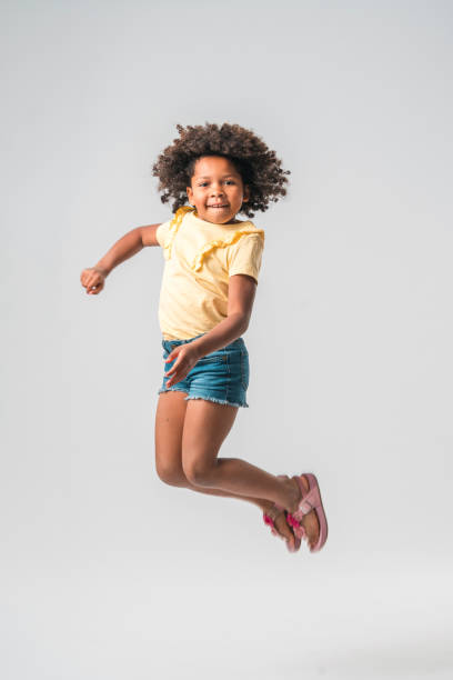istock Happy Multiracial Girl in Studio 1454075573