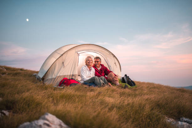 istock Romantic Senior Couple Camping Outdoors 1454075644