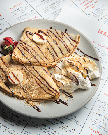 Crapes with banana, strawberry and chocolate, food photography (Click for more)