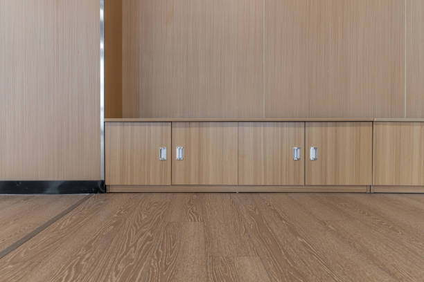 istock Wood floor, wall and cabinets in the empty dance room 1454080042
