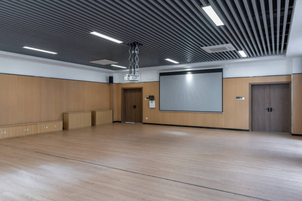 istock Projection screen and wooden floor of empty dance classroom 1454080069