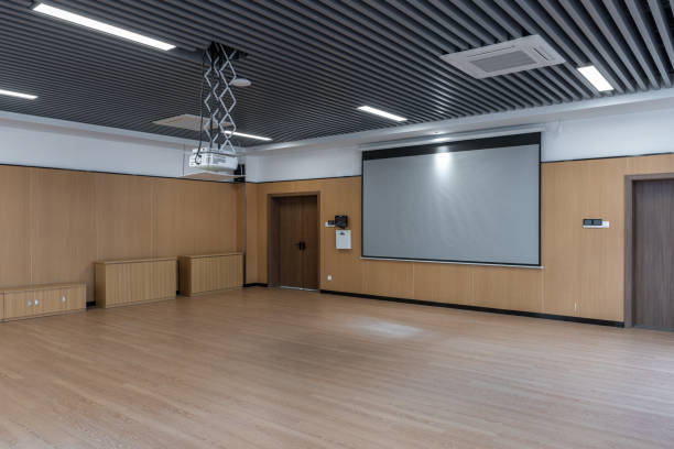 istock Projection screen and wooden floor of empty dance classroom 1454080233