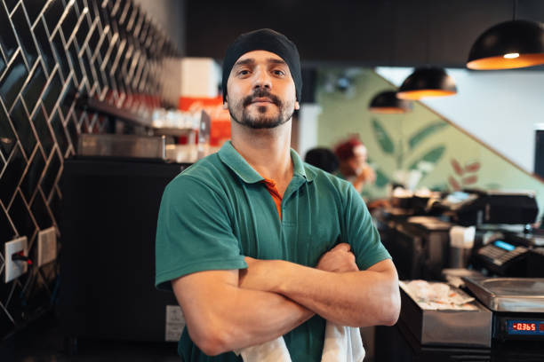 istock Portrait of a restaurant employee 1454083889