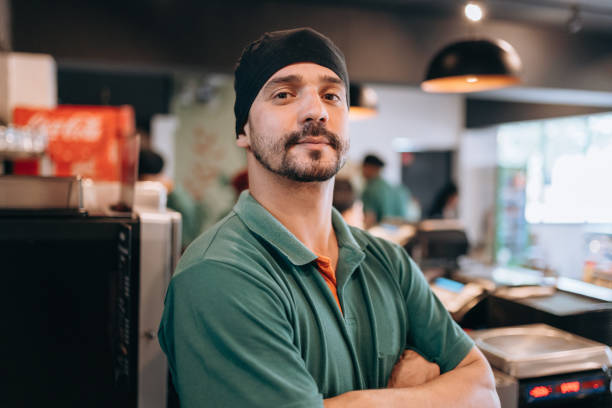 istock Portrait of a restaurant employee 1454083899