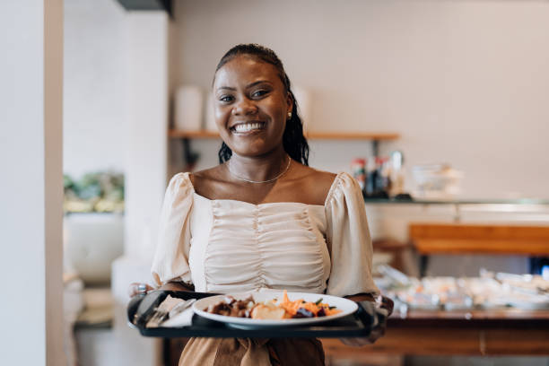 istock Woman at self service restaurant 1454083936