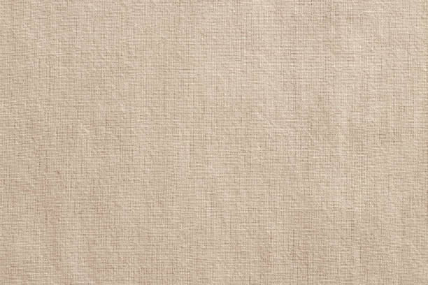 istock Brown cotton fabric texture background, seamless pattern of natural textile. 1454085809
