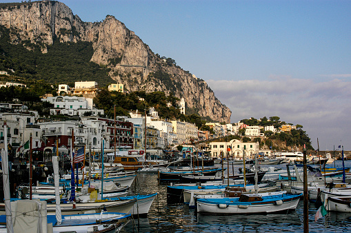 ISLE OF CAPRI, ITALY with small fishing boats tied up in the harbor.