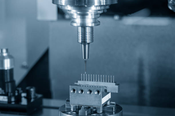 istock The CNC milling machine cutting the copper electrode parts with solid ball end mill. 1454088571