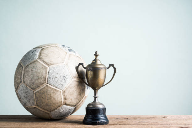istock football and vintage trophy 1454095509