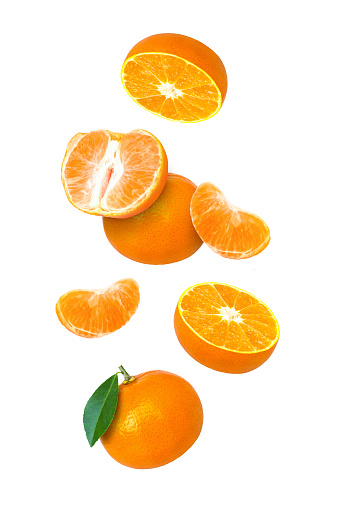 Fresh peeled tangerine with peel isolated on white background.