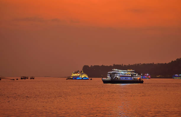 istock Casino ships sailing in Mandovi river in Goa during sunset. 1454102014