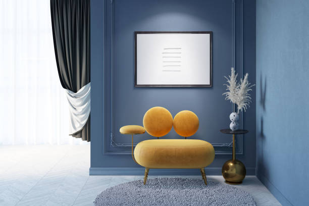istock A classic dark blue interior with the illuminated horizontal poster above the original orange armchair, feathers in a vase on the decorative table, and black curtains in the background. 1454102810