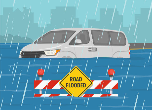 Flooded road and rainy weather conditions. Partially submerged car and warning sign with barrier on a flooded road. Flooded road and rainy weather conditions. Partially submerged car and warning sign with barrier on a flooded road. Flat vector illustration template. flood stock illustrations