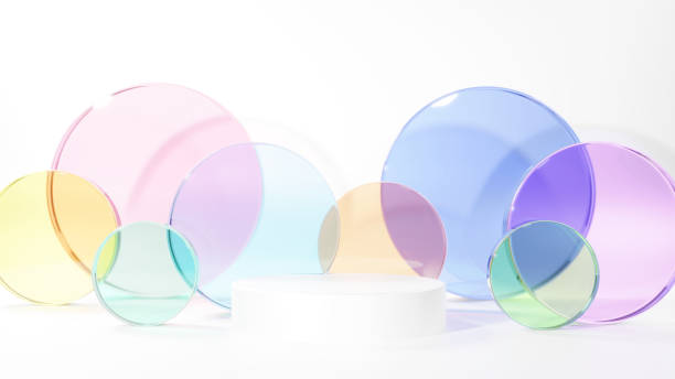 istock 3D Illustration.Image of several colorful circular glass pieces on a white background. White base. Product space (horizontal) 1454105712