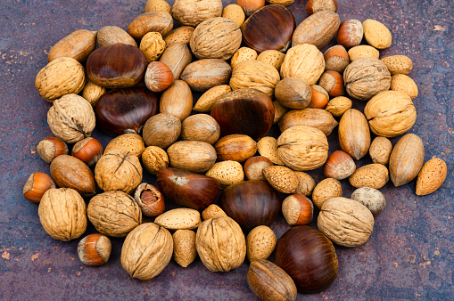 Walnut, chestnut, almond, hazelnut on the table.Healthy food and snacks