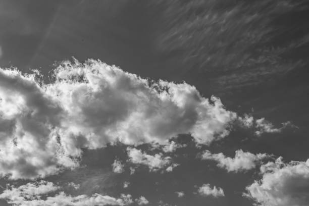 istock Photography on theme white cloudy sky in unclear long horizon 1454115538
