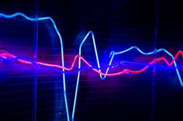 Abstract neon tube light symbol of financial chart stock photo