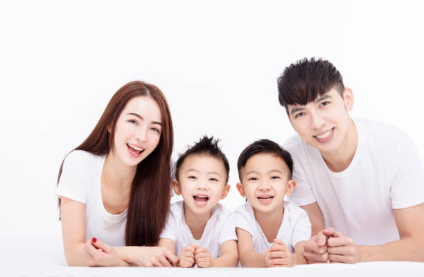 Happy Asian family isolated on white background