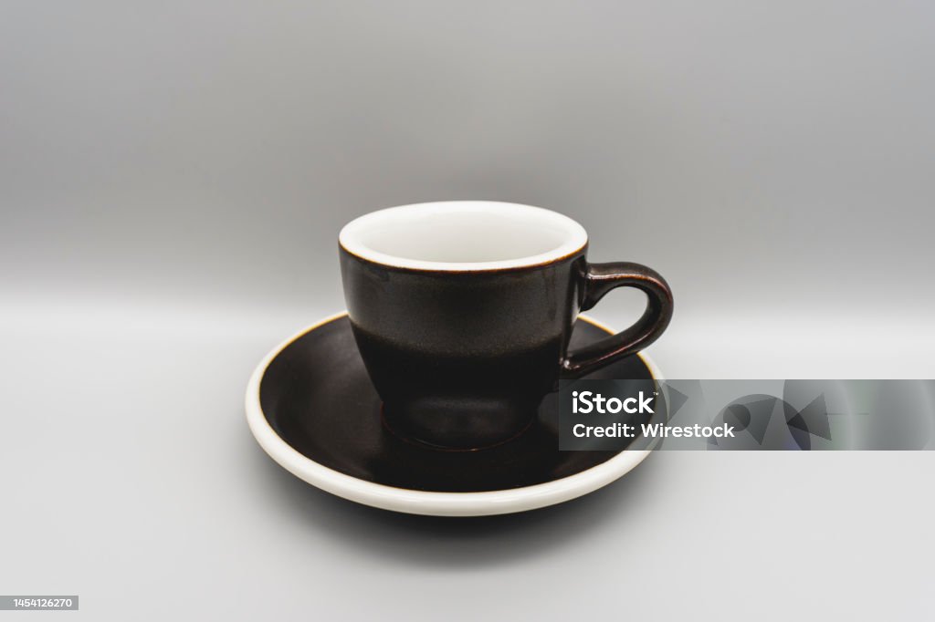 Horizontal shot of a espresso cup A horizontal shot of a espresso cup with saucer. Beauty Stock Photo