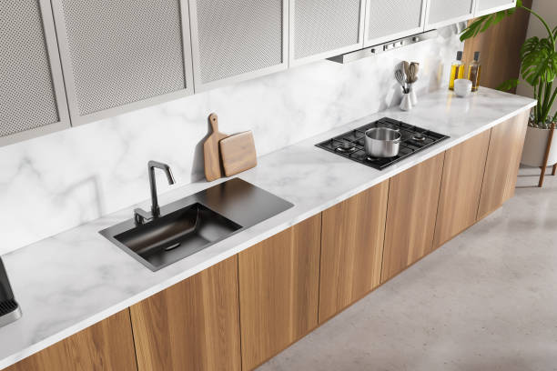 istock Bright kitchen room interior with white marble wall, concrete floor 1454126997
