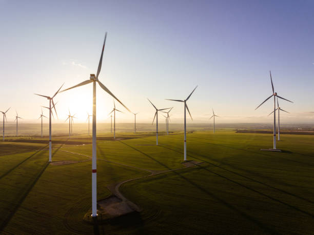 istock Aerial view of wind turbines in evening light 1454127720