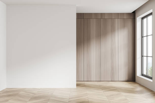 istock Stylish empty room interior and panoramic window on countryside. Mockup wall 1454128278