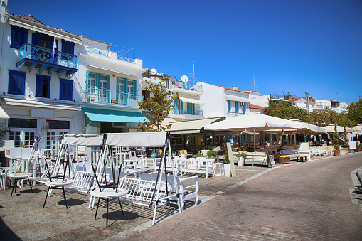 The town front and the seafront tavernas at Skiathos town, Greece