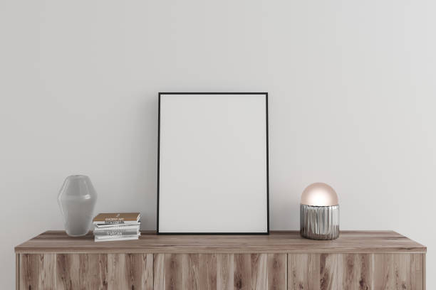 istock White living room interior with drawer and art decoration, mockup frame 1454130180
