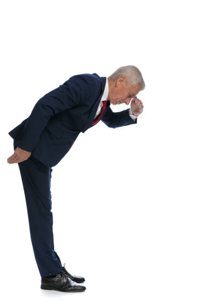 businessman protecting his eyes so he can see better