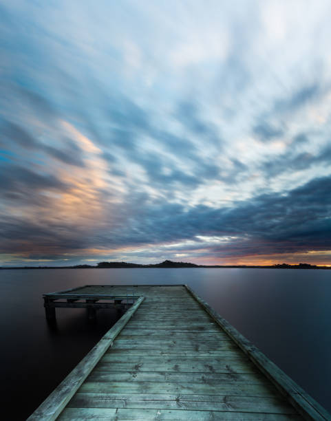 istock Sunset on Strahan wharf overlooking Morse Bay 1454131824