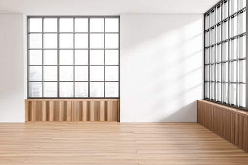 Bright empty room interior with panoramic windows with Singapore city skyscrapers view. White wall, wooden floor. Concept of spacious place in center of megapolis made for creative idea. 3d rendering