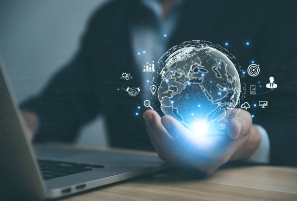istock Businessman using laptop and hands showing global icons. Big Data Digital Link Technology Global Achievement 1454131989