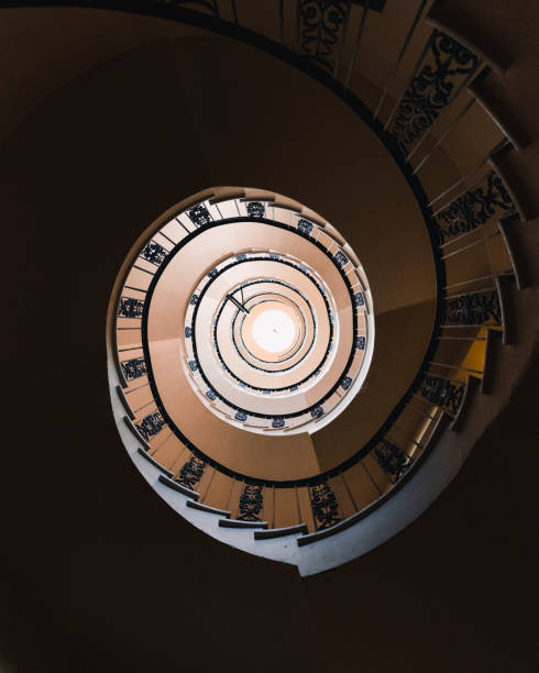 istock Interior of a spiral staircase from beneath 1454132036